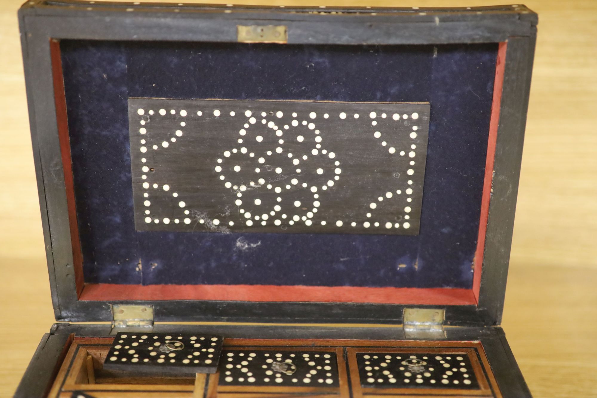 Four Ceylonese quillwork boxes, early 20th century, largest 28 x 19 x 10cm, an Indian inlaid box a Victorian rosewood sewing box